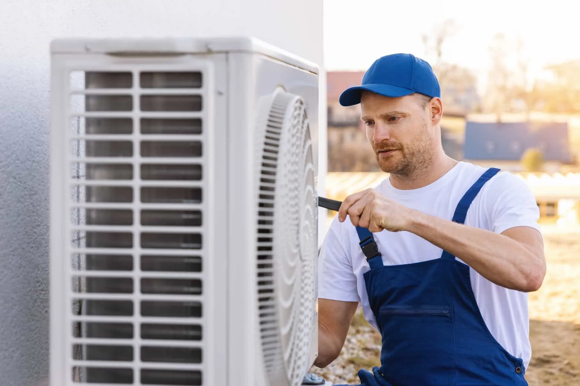 HVAC technician working on equipment